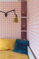 Children’s bedroom with Marimba Wallpaper in Apricot, featuring a Spirograph illusion. Interior design by Claudia Dorsch Interiors. A playful yet sophisticated design that will grow with the occupant.